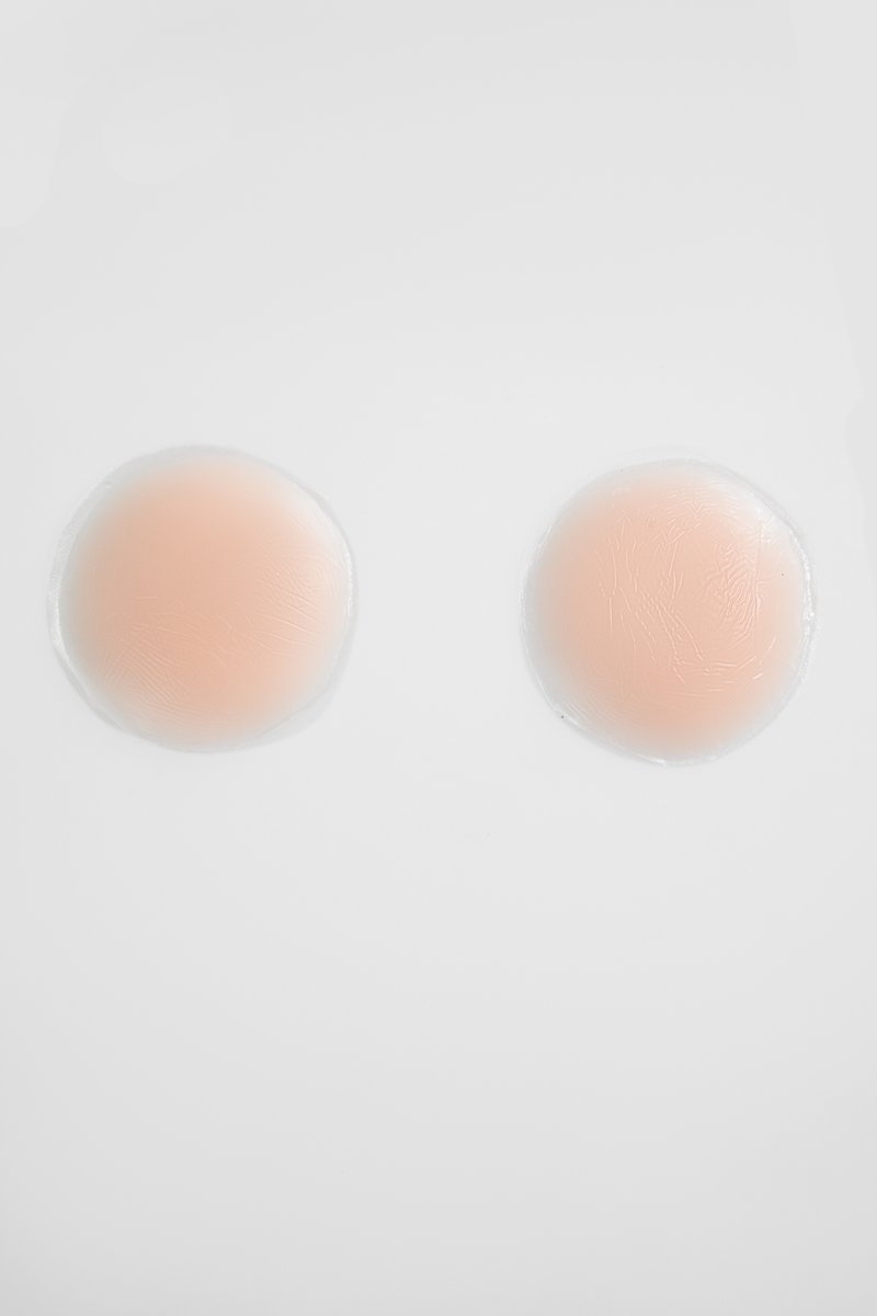 Бежеві силіконові накладки на груди
Бежеві силіконові накладки на груди