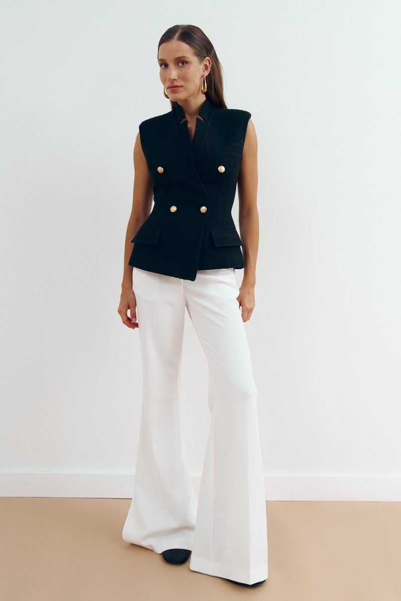 Чорний однобортний твідовий жилет
Чорний однобортний твідовий жилет