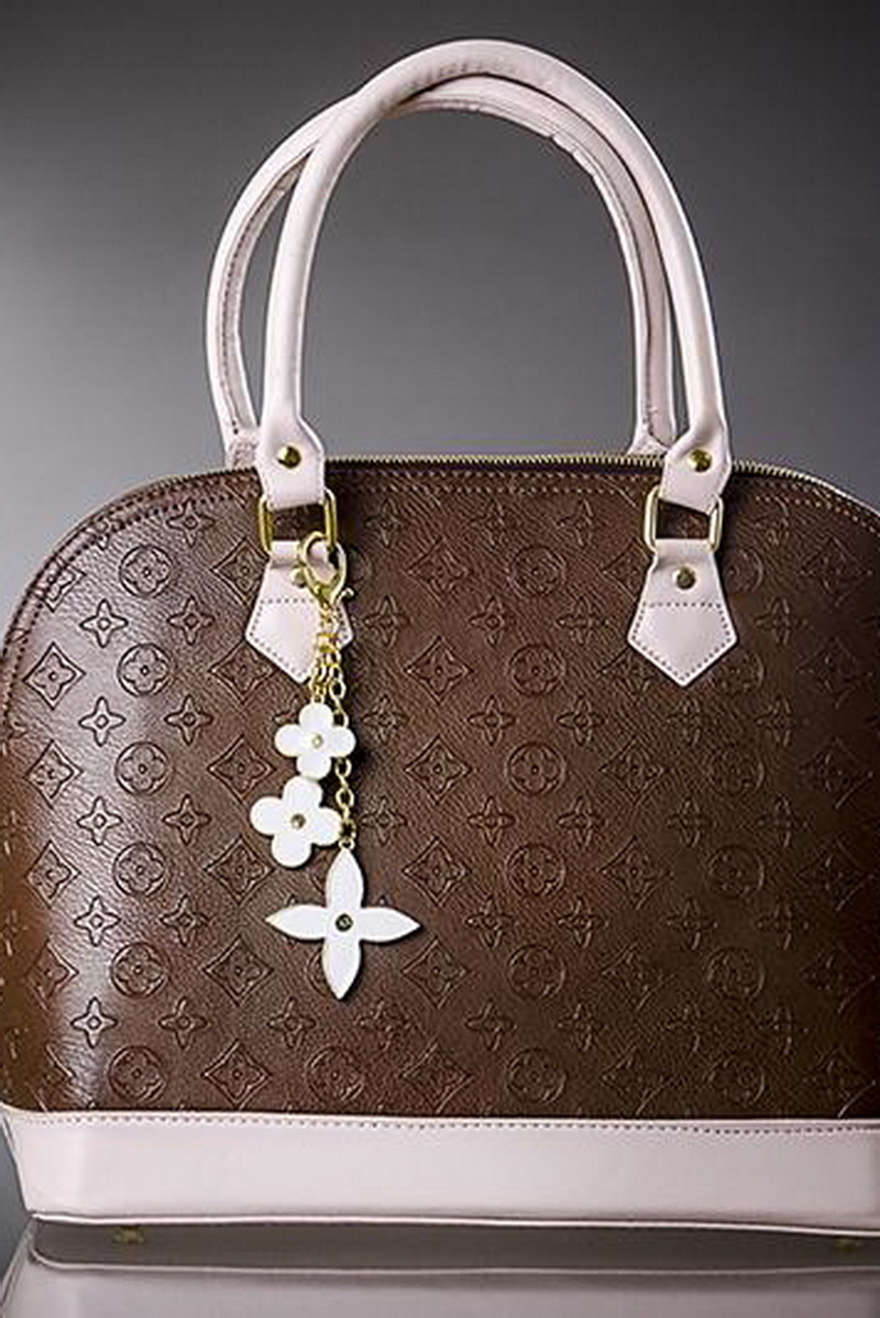 Сумка Louis Vuitton средняя с тиснением фотография 1