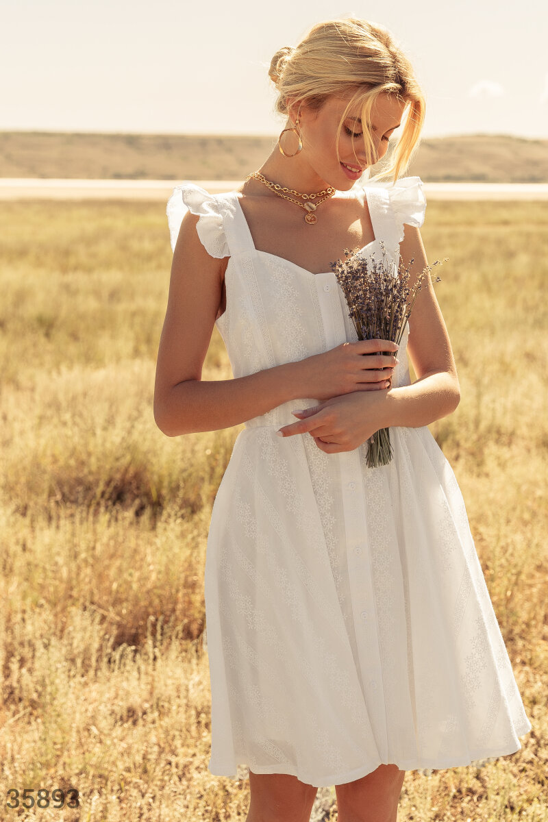 Subtle sundress with minimalist floral embroidery