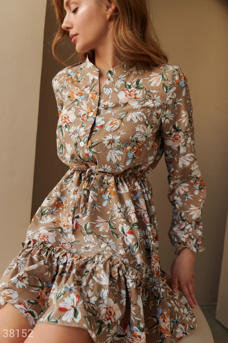 Бежевое платье с цветочным принтом фотография 1