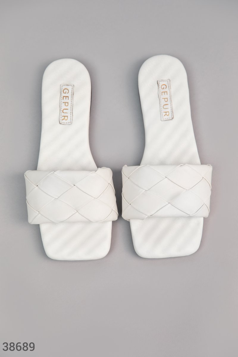 White flip flops with flat soles