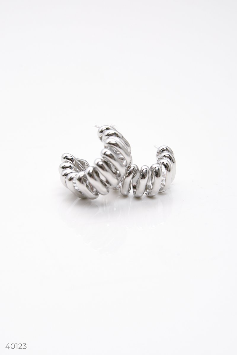 Silver earrings in the form of a spiral