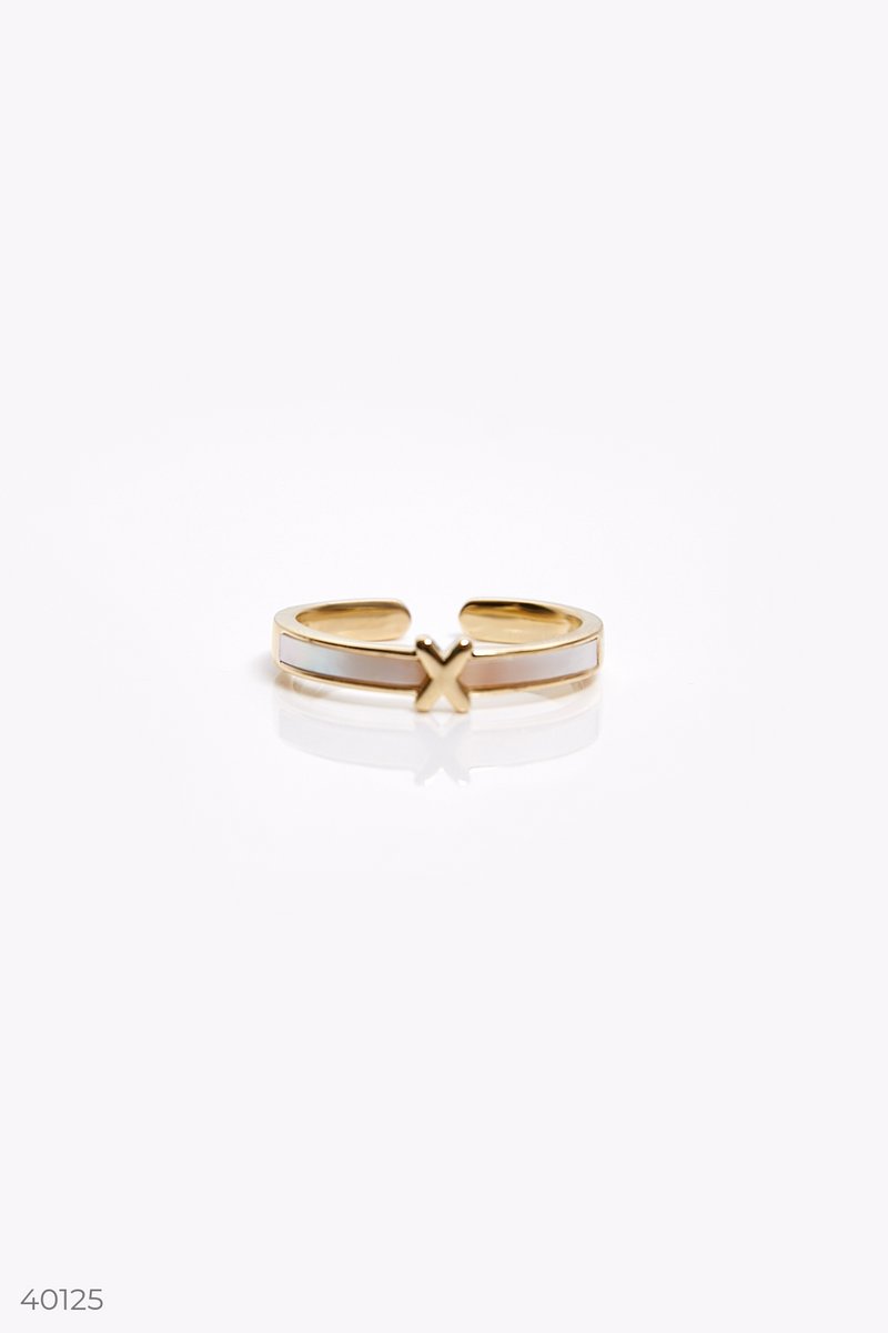 Gold-tone ring with white inserts