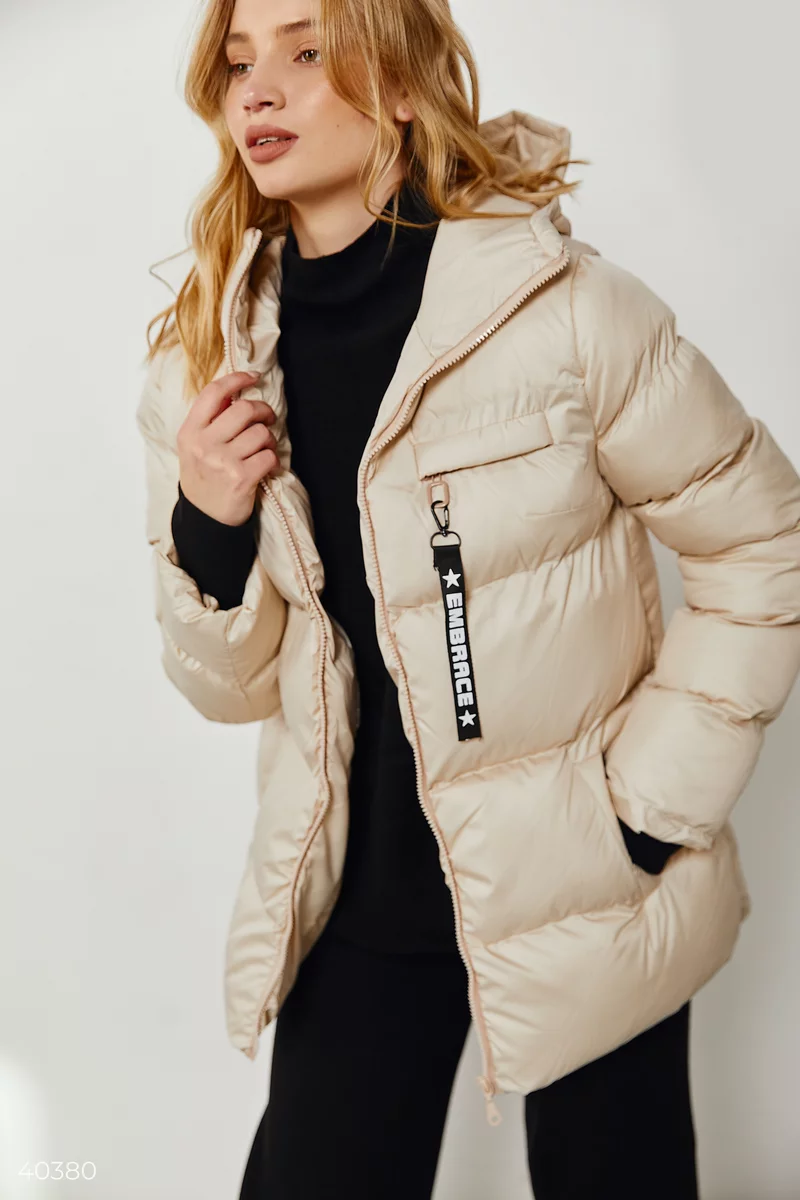 Short quilted jacket in beige photo 1