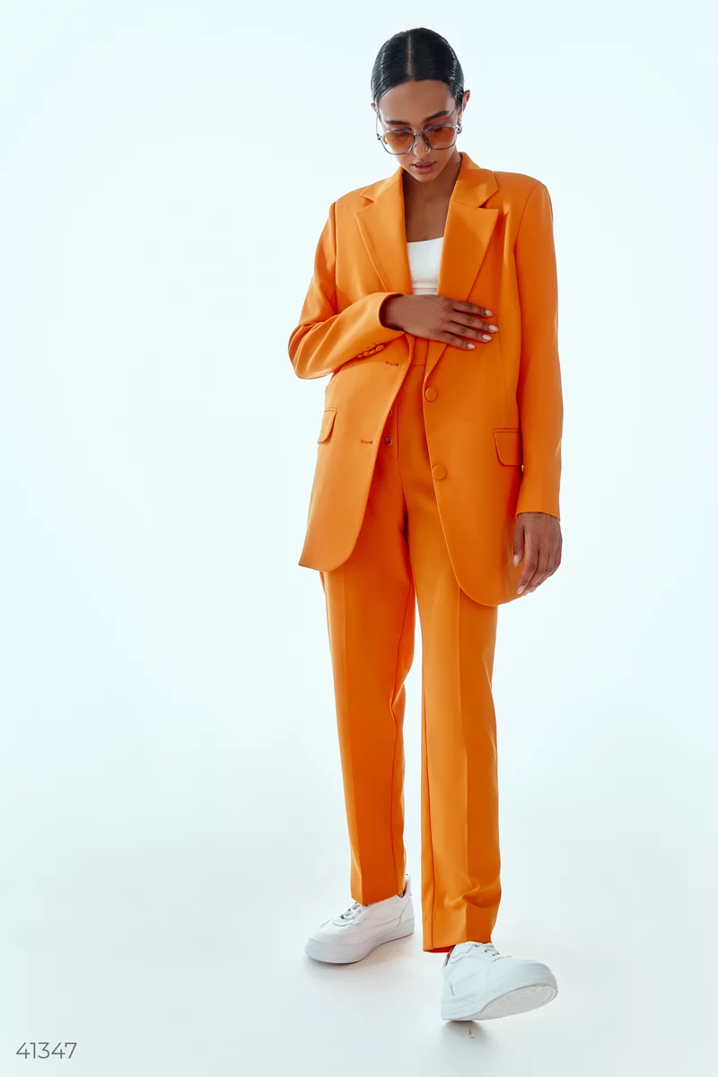Ефектні оранжеві штани фотографія 1