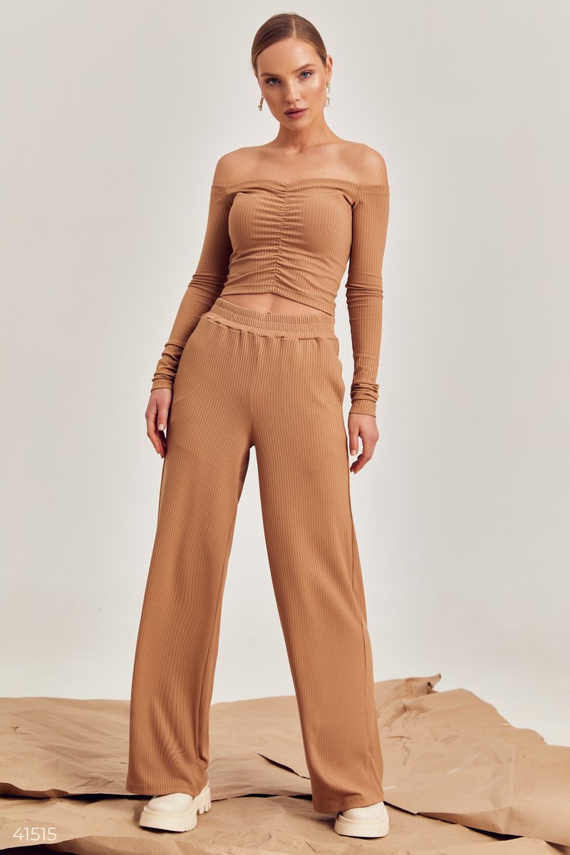 Beige knitted suit with wide leg trousers