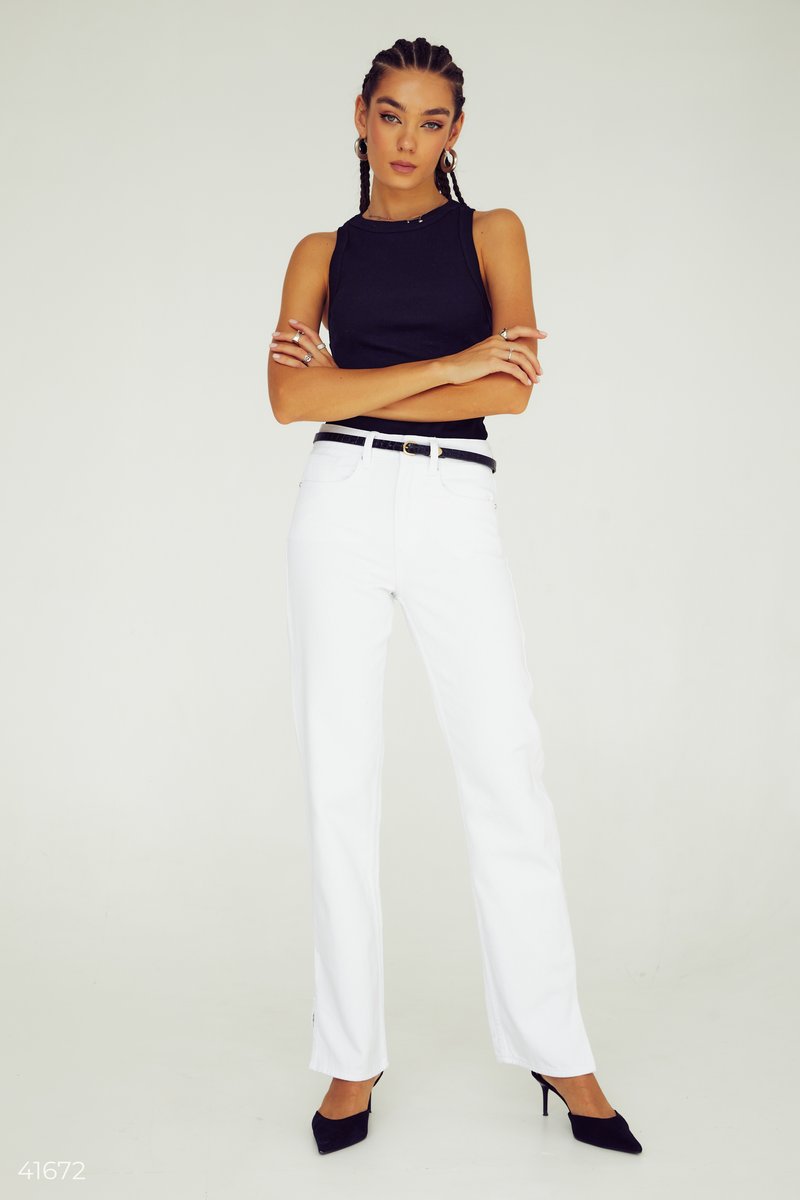 White jeans with slits