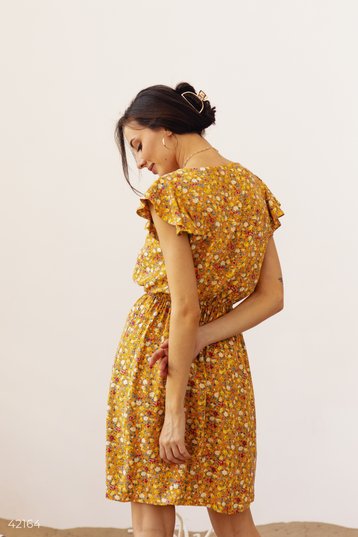 Yellow sundress sales with flowers