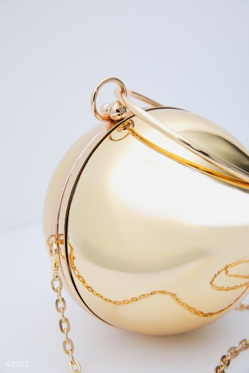 Золотистый клатч в форме шара фотография 2