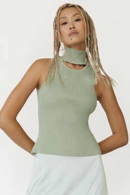 Beige knitted top with a high neck photo 2