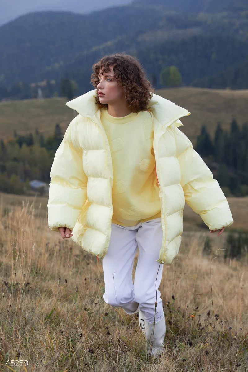 Warm three-dimensional down jacket in a lemon shade photo 2