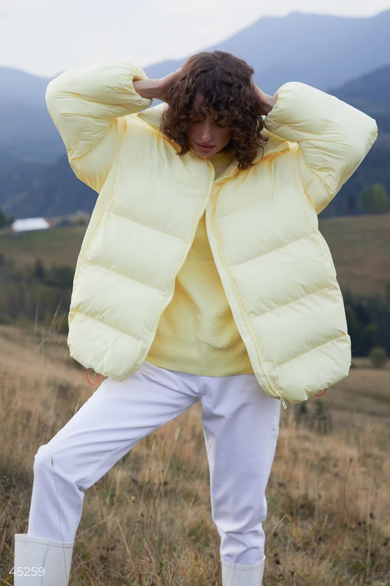 Warm three-dimensional down jacket in a lemon shade photo 4