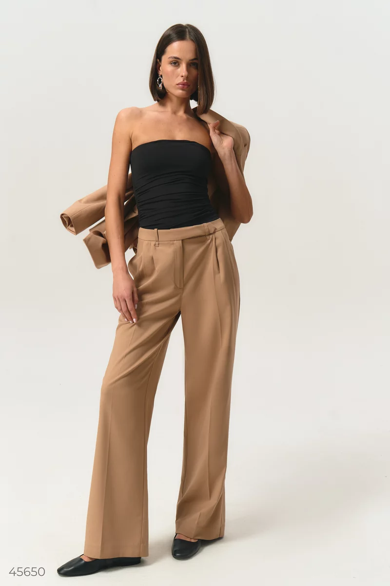 Beige palazzo pants with arrows photo 2