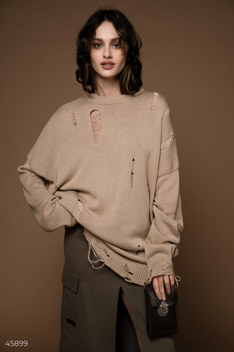 Long beige sweater with a torn edge photo 2