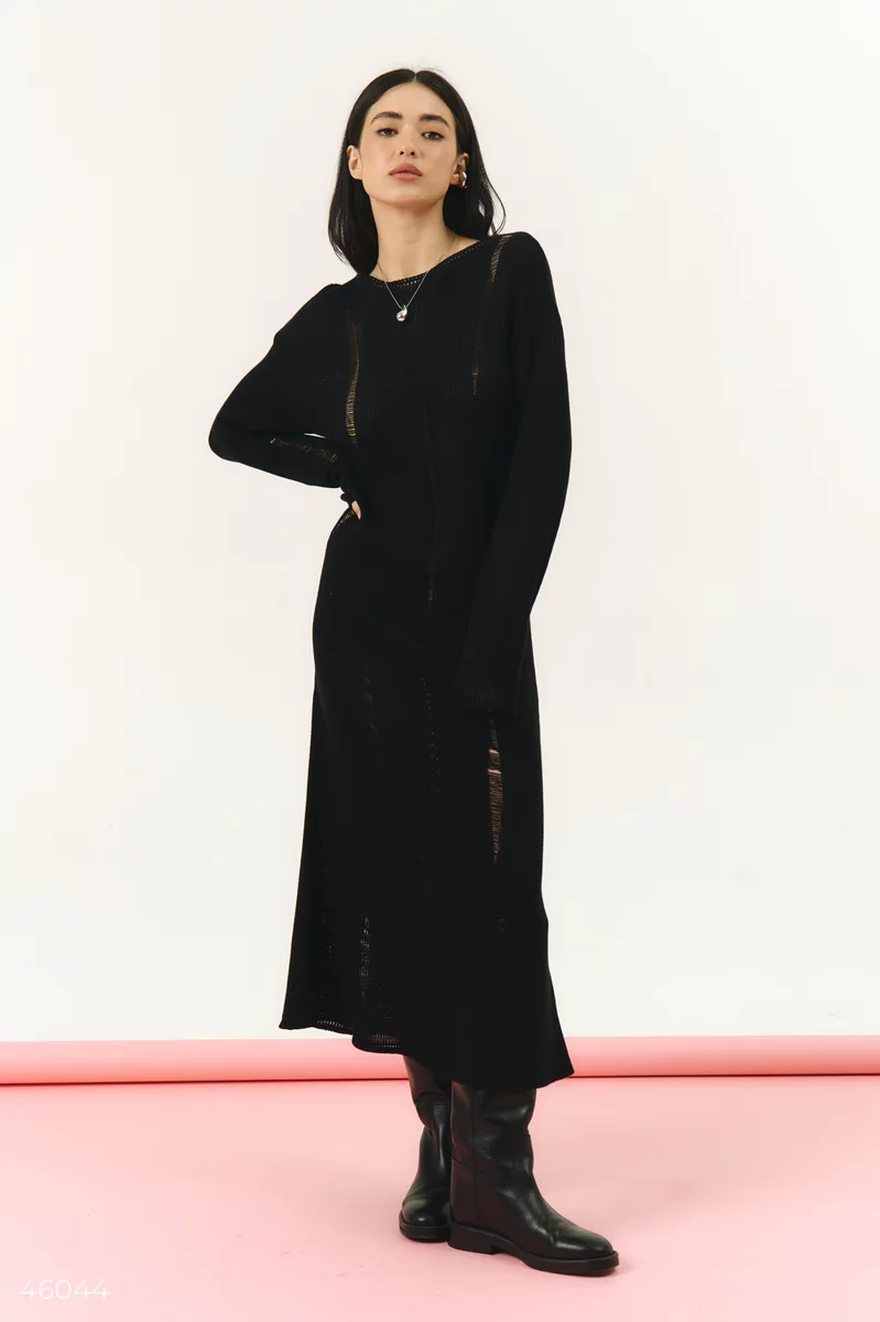 Black knitted dress with torn details photo 1