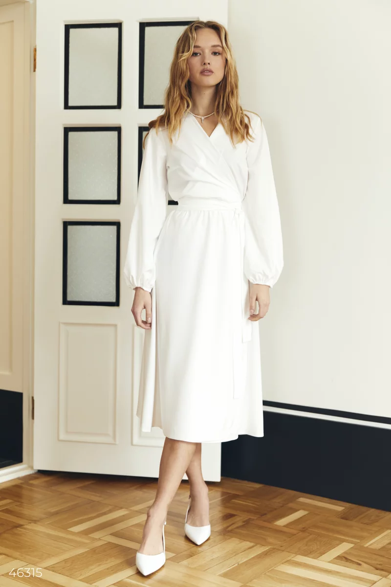 A white midi dress with a scent photo 1
