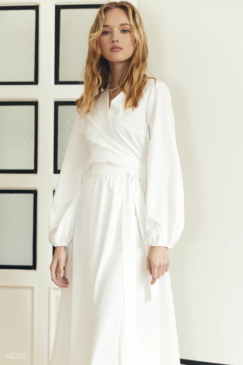 A white midi dress with a scent photo 2