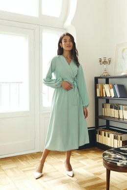 An olive-colored midi dress with a scent photo 2