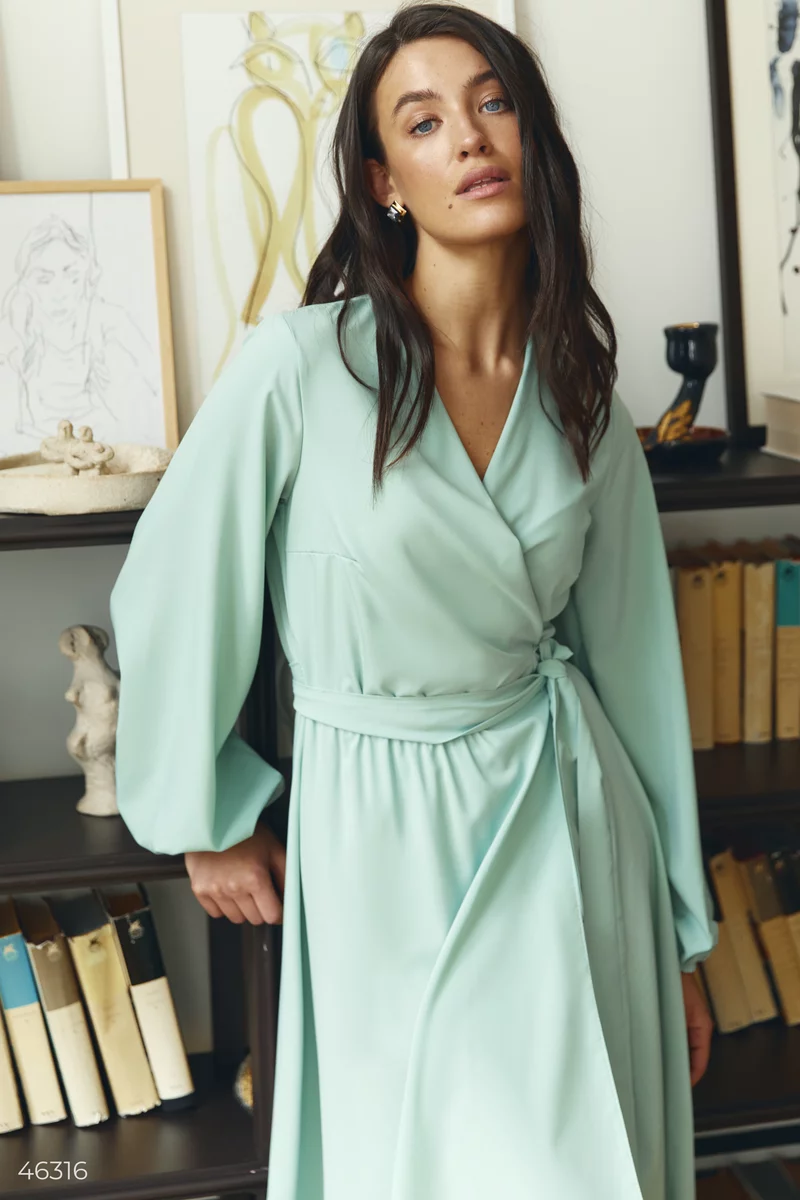 An olive-colored midi dress with a scent photo 2