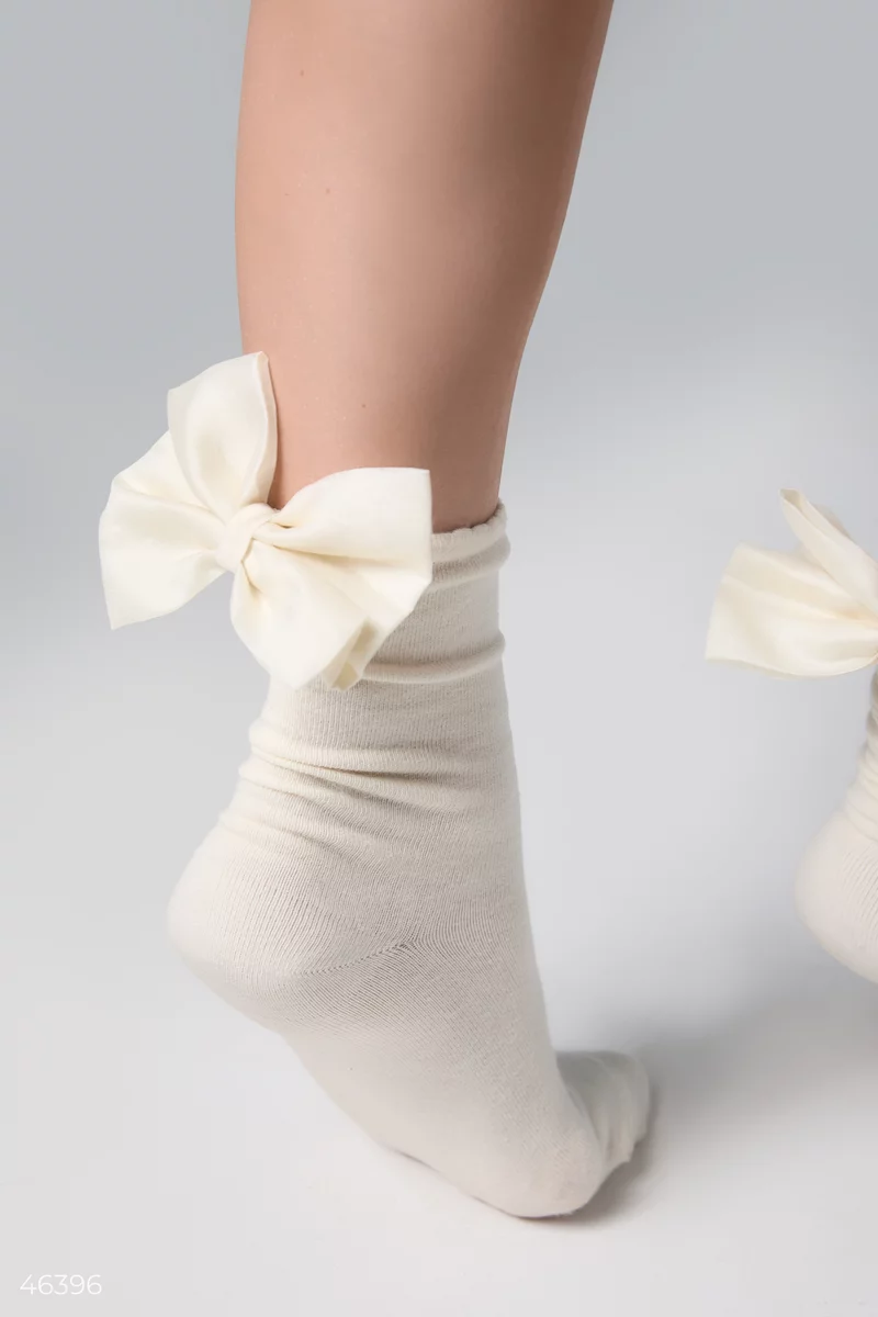 Молочные носки со съемным бантом фотография 2