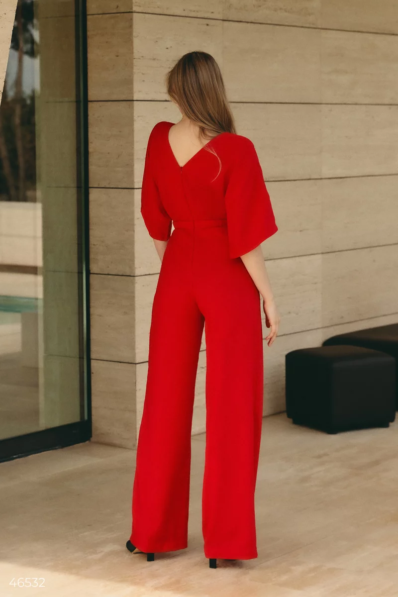 Red jumpsuit with draping at the waist photo 4