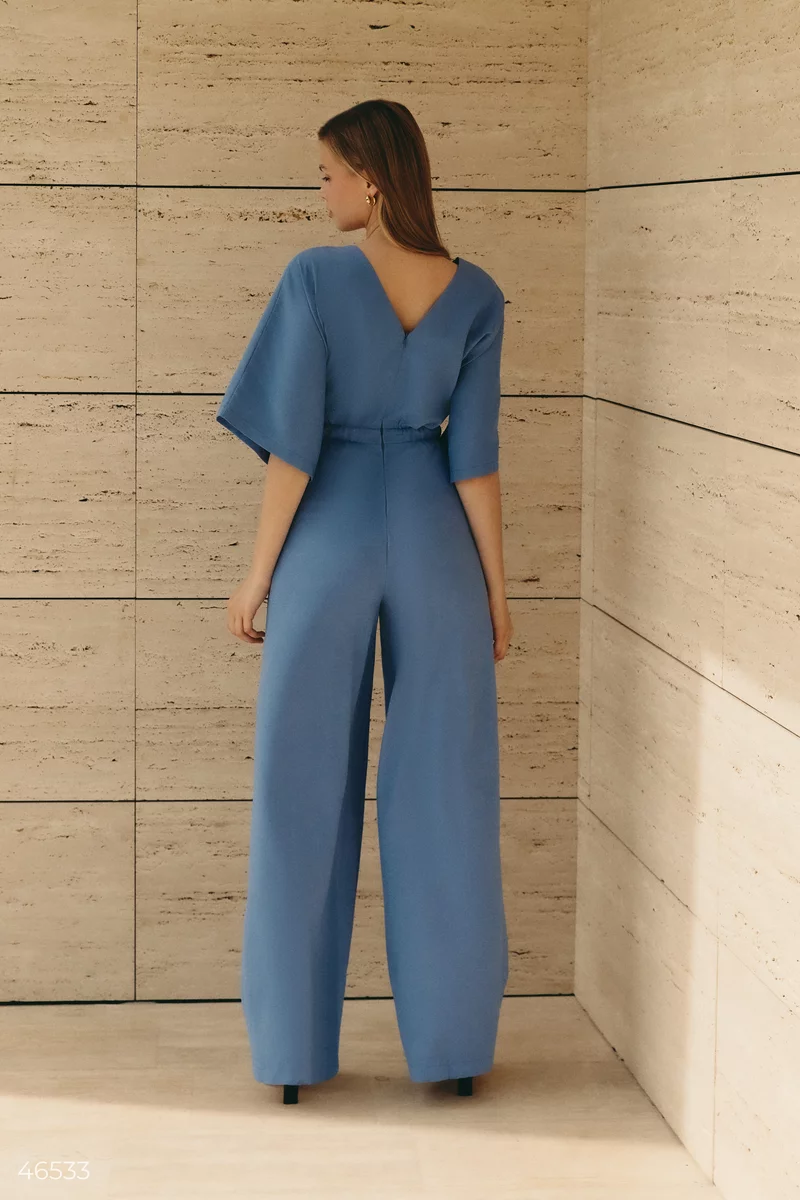 Blue jumpsuit with draping at the waist photo 4