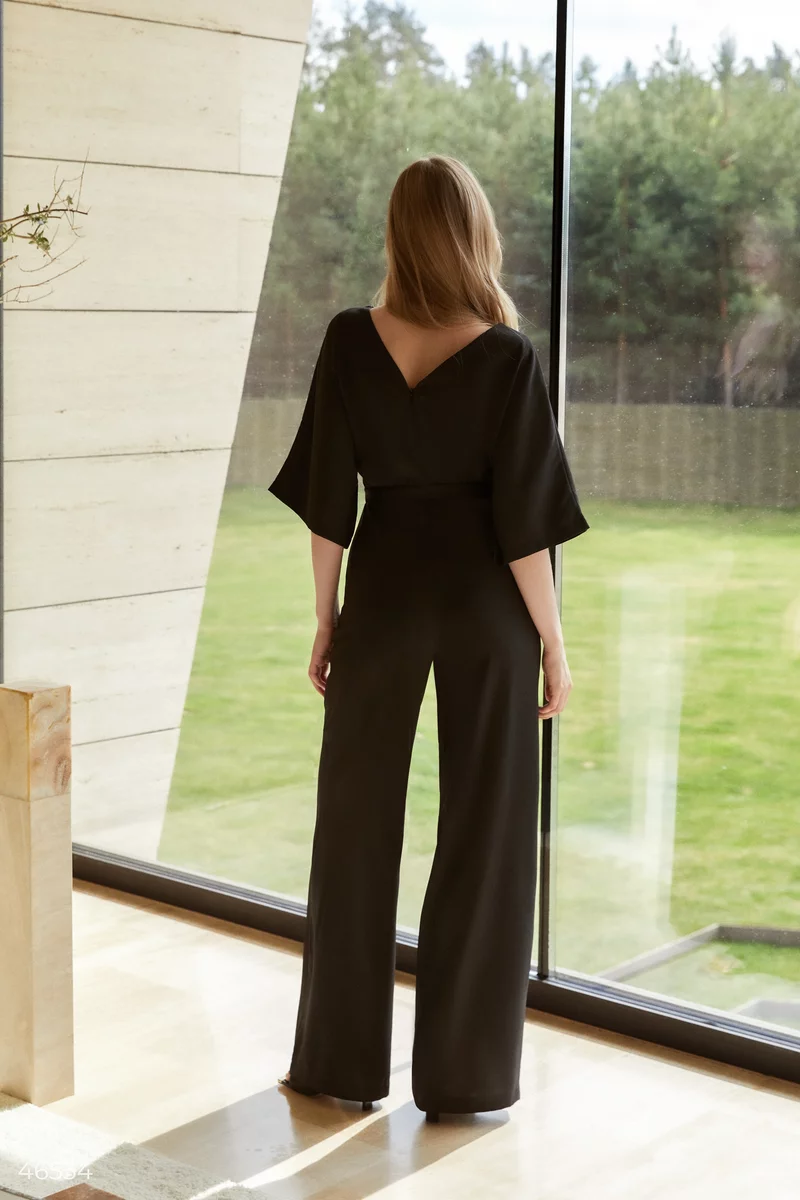 Black jumpsuit with draping at the waist photo 5