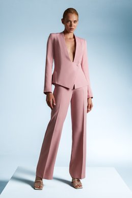 Розовый костюм с пиджаком и брюками фотография 3