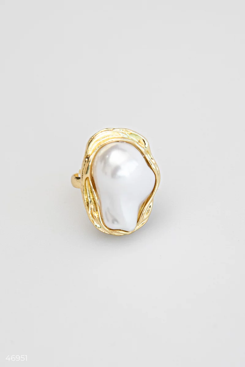 A golden ring with a mother-of-pearl insert photo 3