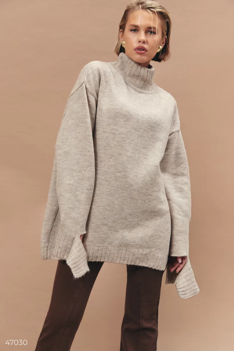 Beige oversized sweater with accent cuff photo 2