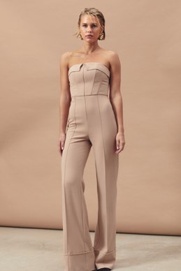 Beige jumpsuit with open shoulders