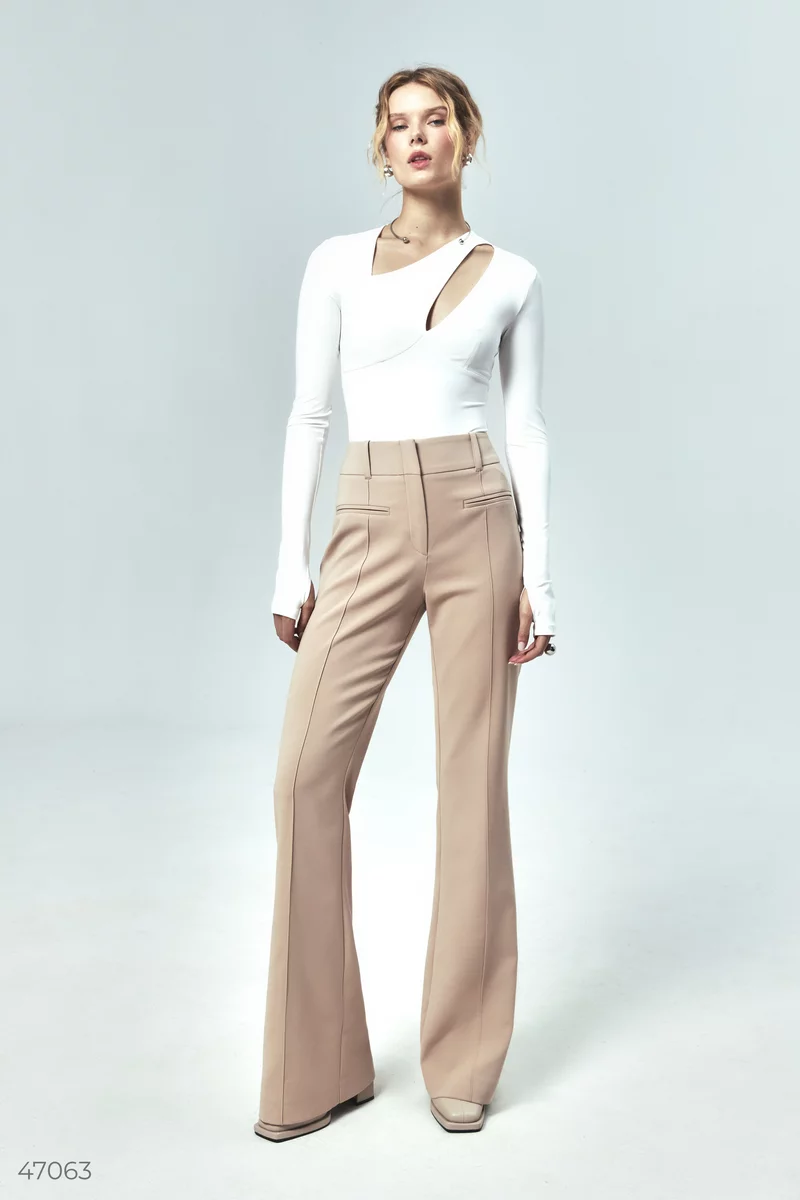 Beige flared pants with slits photo 1