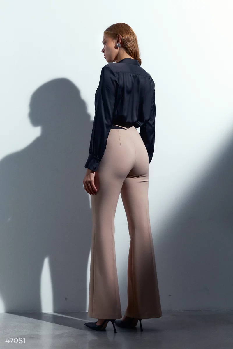 Beige trousers with an asymmetric fastening photo 5