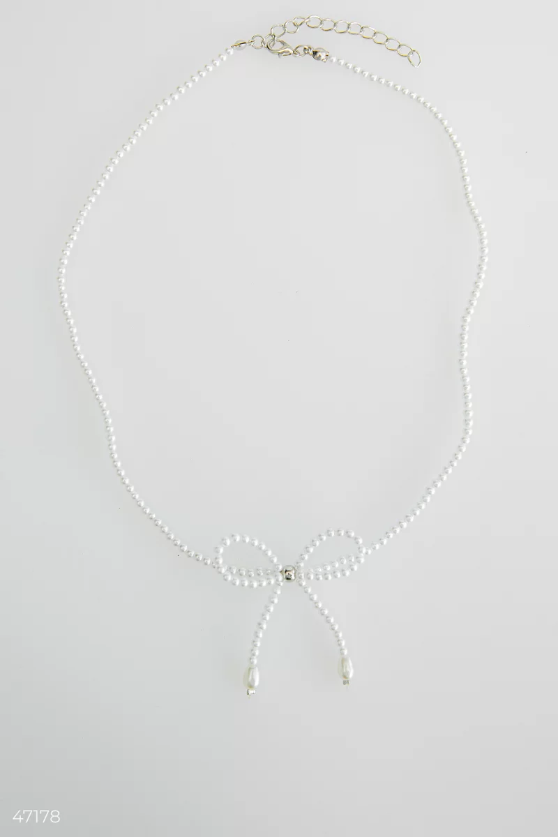 Necklace with pearls and a bow photo 4