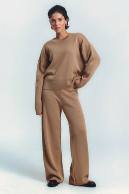 Beige knitted suit with pants photo 1