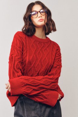 Red elongated sweater with braids