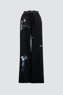 Black trousers with an author's print