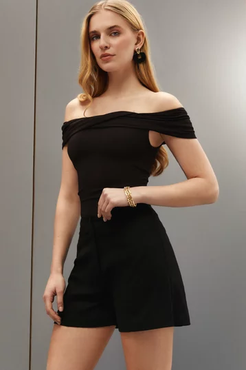 Black knitted top with drape