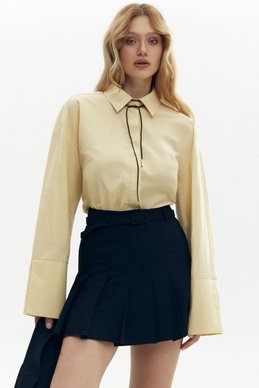 Oversized yellow shirt with wide sleeves