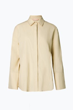 Oversized yellow shirt with wide sleeves