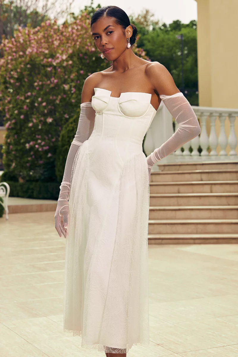 Milky midi dress with a full sequined skirt photo 1