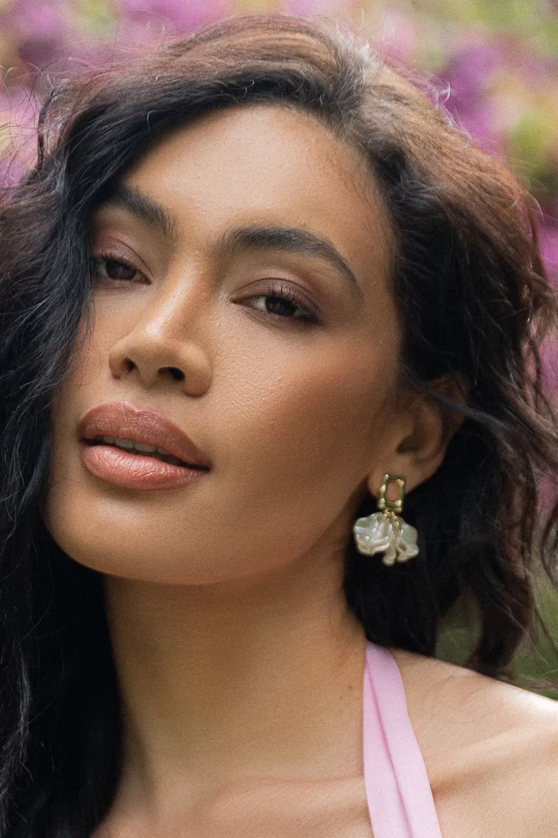 Golden earrings in the shape of a voluminous flower photo 2