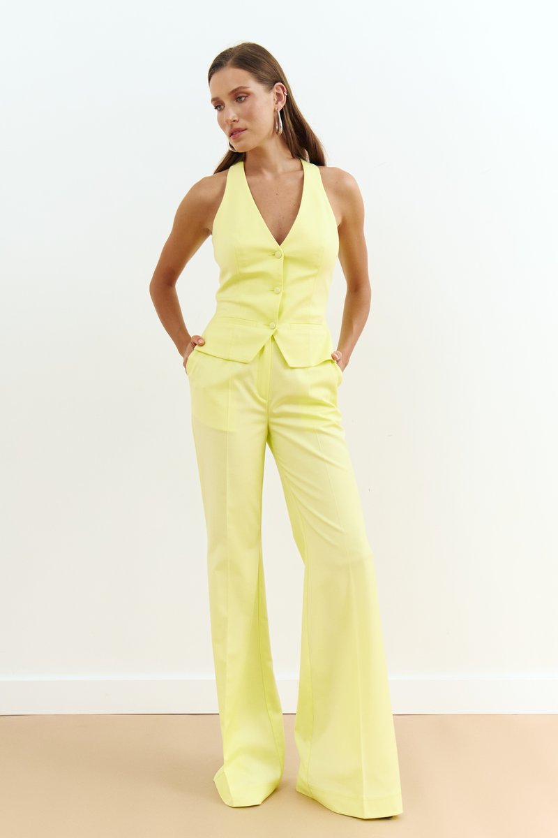 

Жовтий базовий жилет з гудзиками