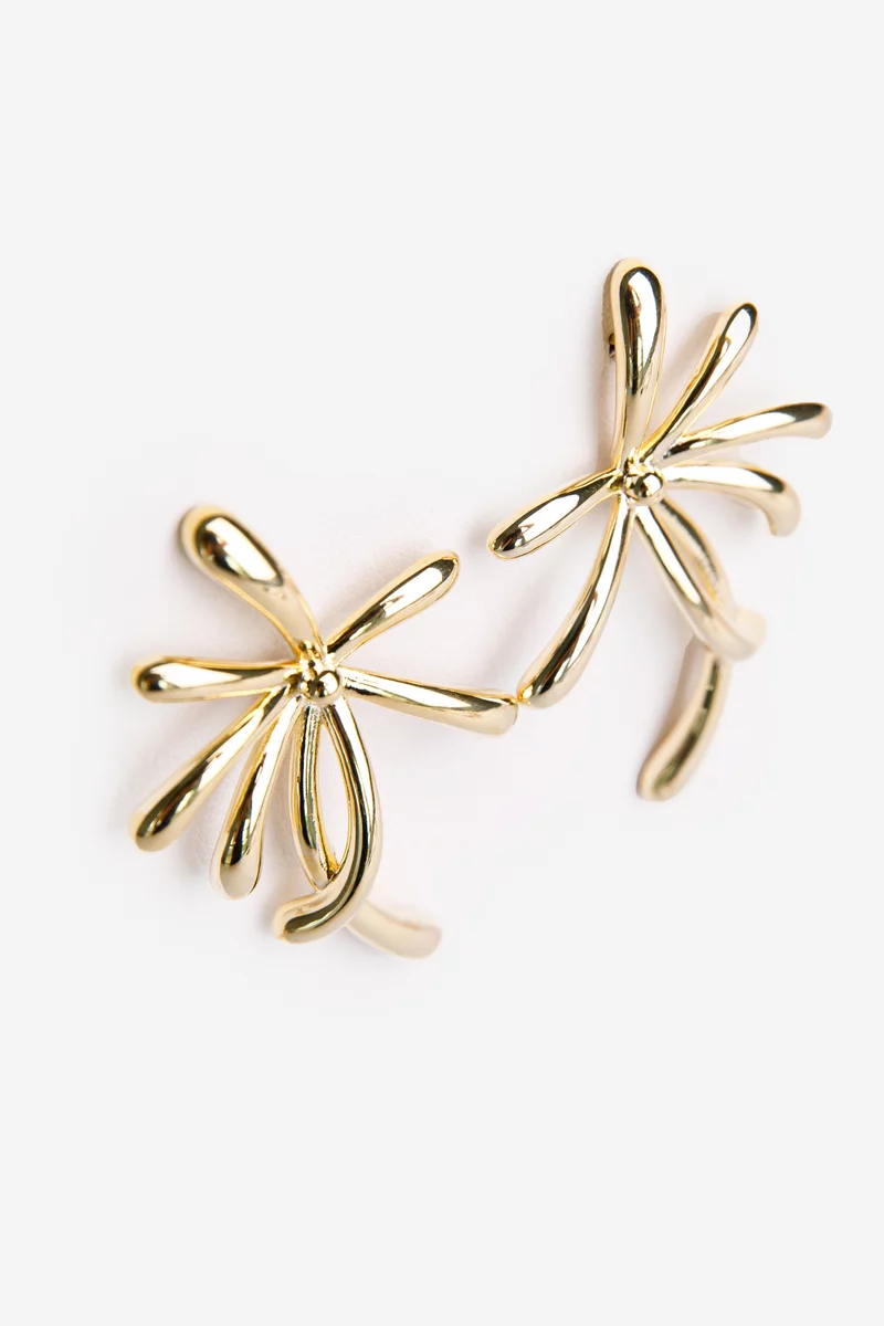 Gold earrings in the shape of a palm tree photo 2