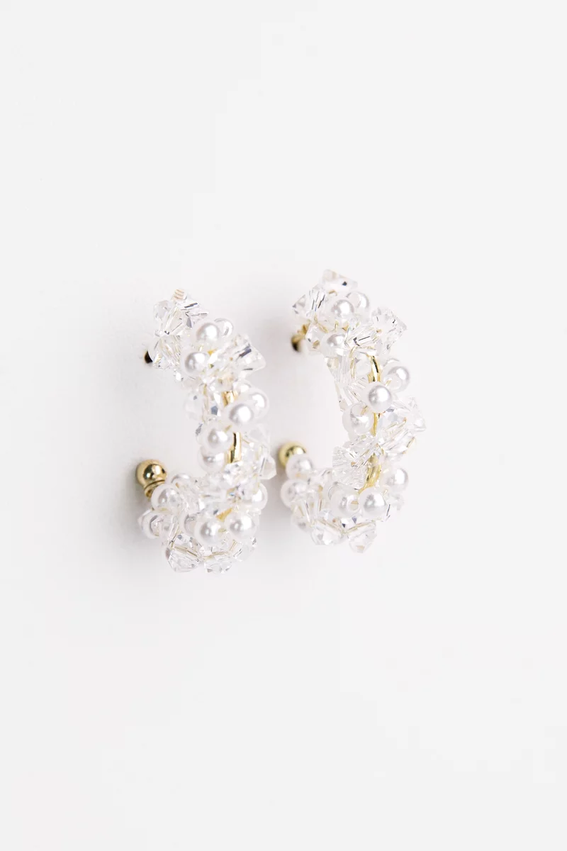 Golden rounded earrings made of beads and beads photo 2