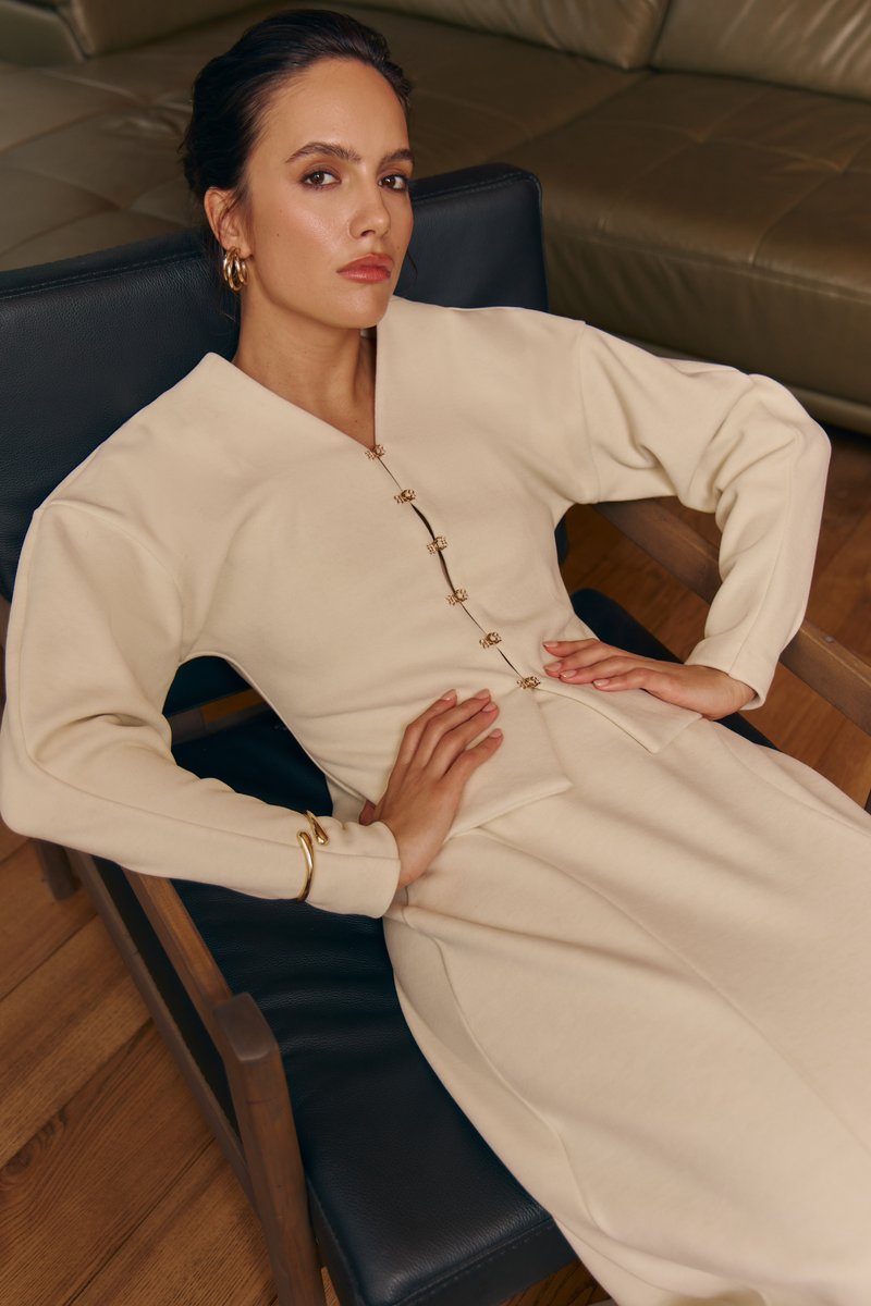 

Молочний трикотажний кардиган-жакет