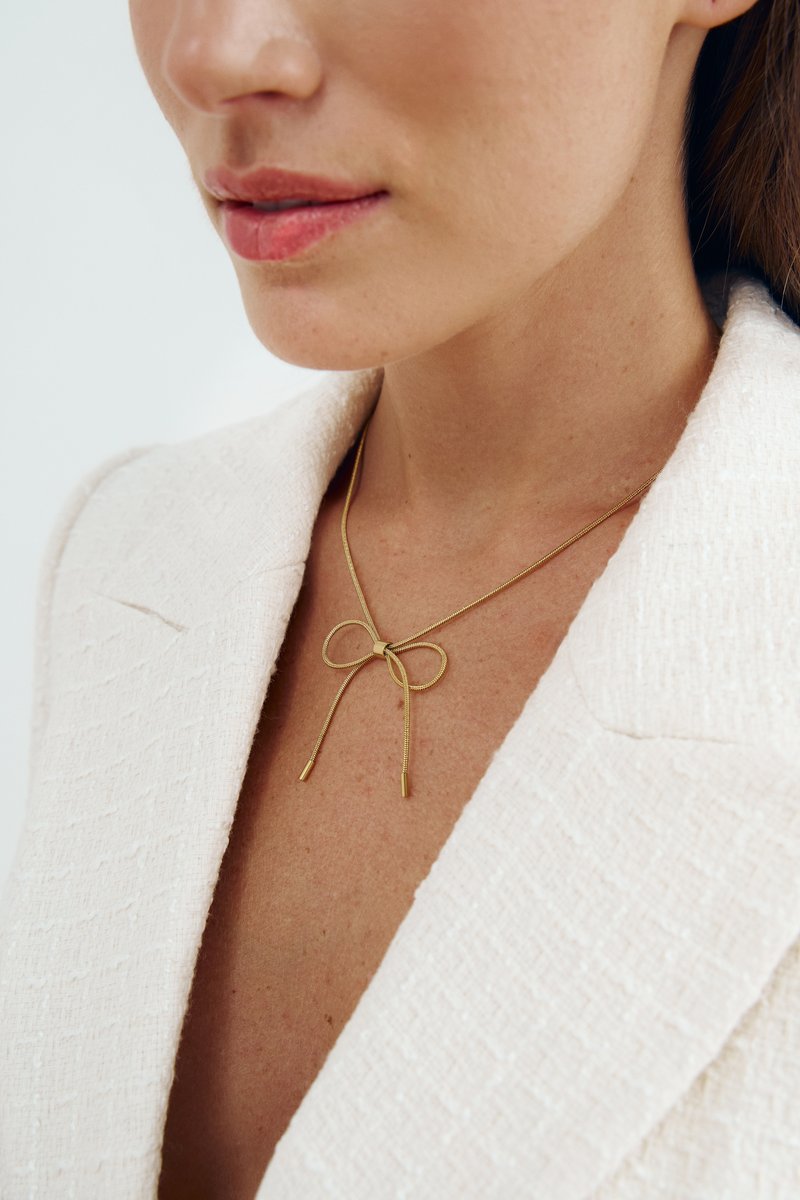 

Золотистий ланцюжок з бантом