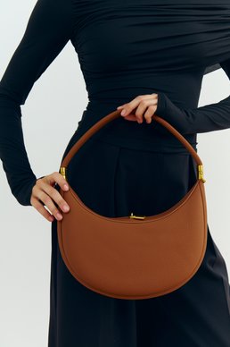 Camel crescent-shaped convertible bag