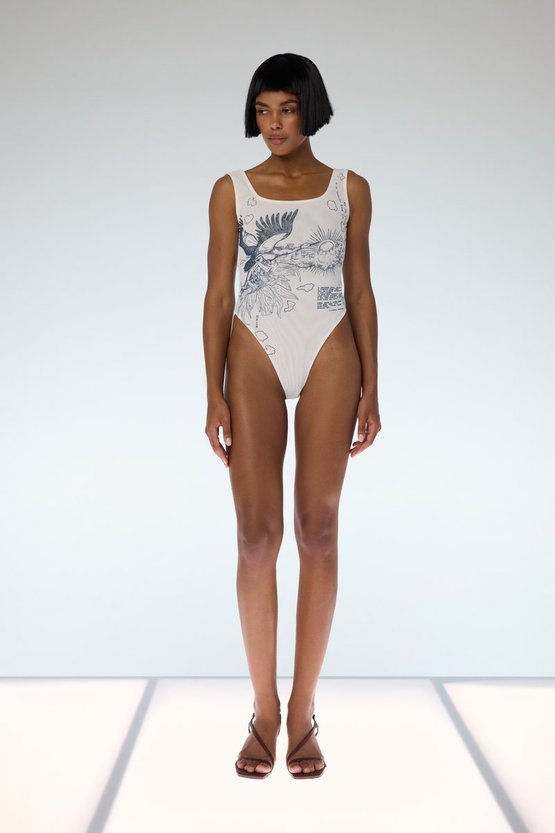 

Молочний боді на бретелях з принтом Душа